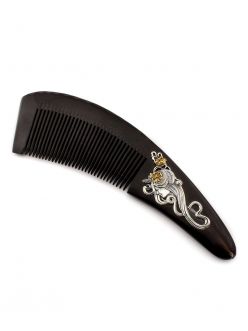 Black horn comb inlaid with silver "Beauty"